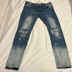 Bleached Painter Skinny Blue Jeans with rips on both knees